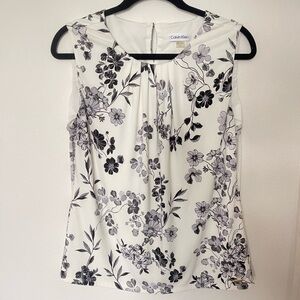 Woman’s floral Calvin Klein blouse